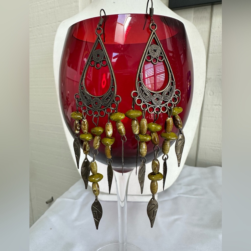 Funky older boho vibe scrollwork and green bead earrings